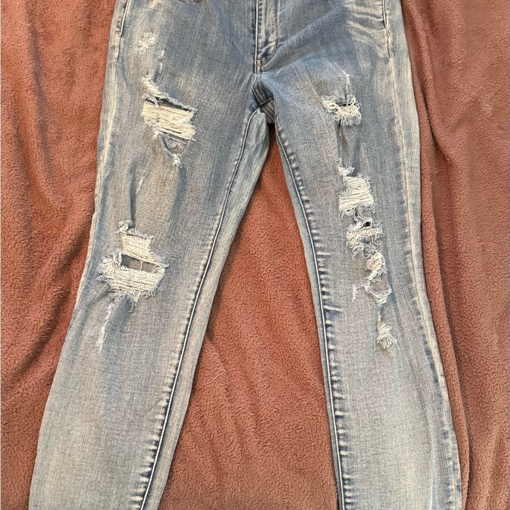 Distressed Light Wash American Eagle Jeans size 14
